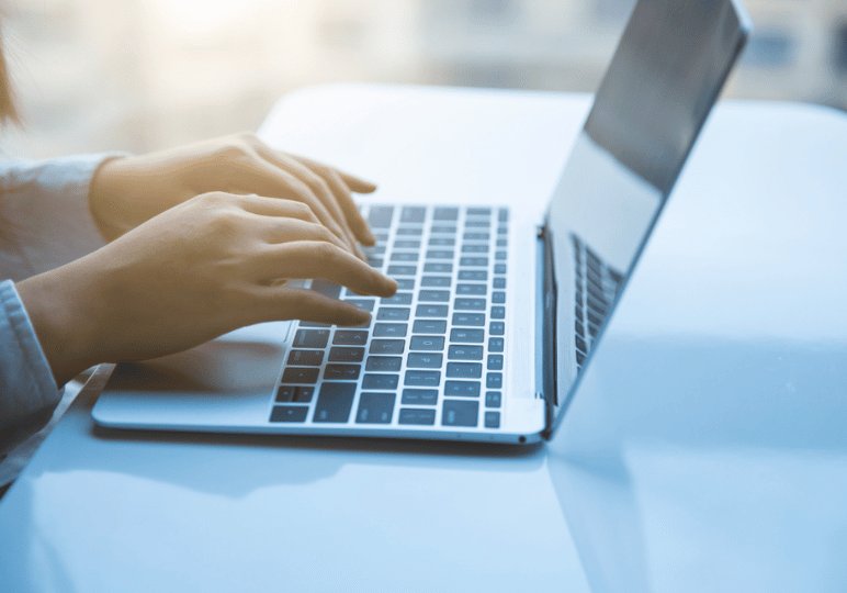 Working on a digital product on the laptop